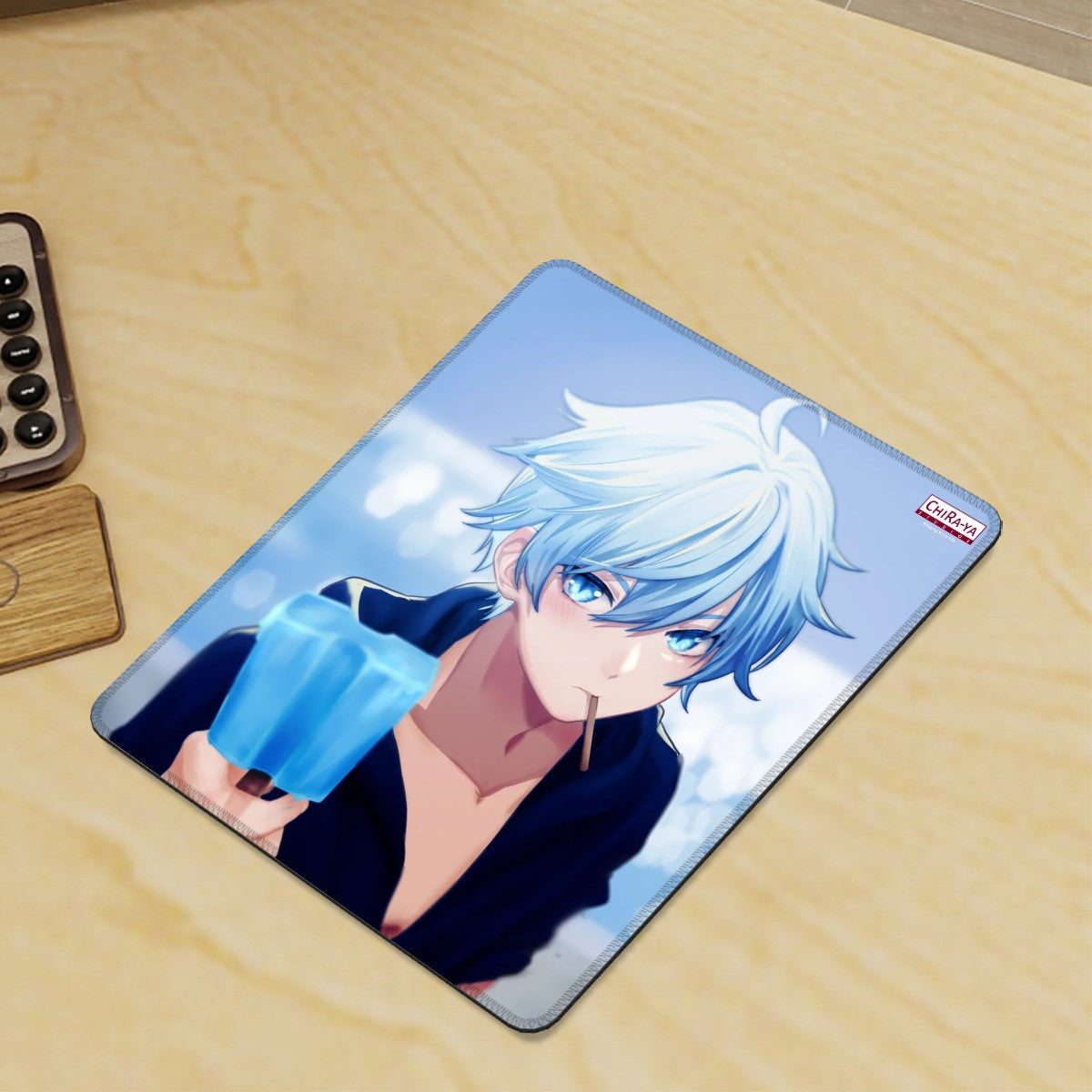 gaming desk with vertical anime mouse pad featuring Chongyun enjoying a popsicle