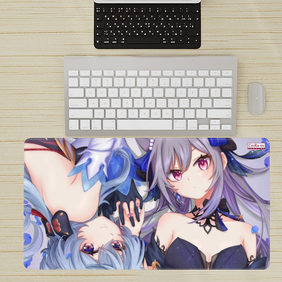 desk setup with extra large anime mouse pad featuring Ganyu and Keqing