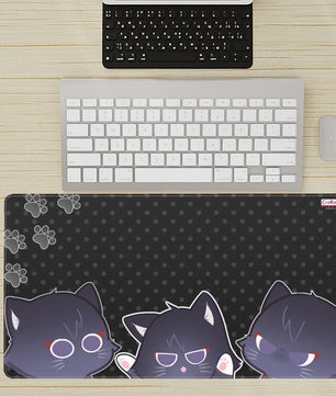 desk setup with extra large anime mouse pad featuring various Scarameow emotions