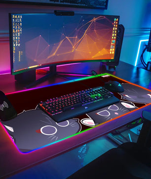 gaming desk setup with anime RGB mouse pad featuring various Scarameow emotions
