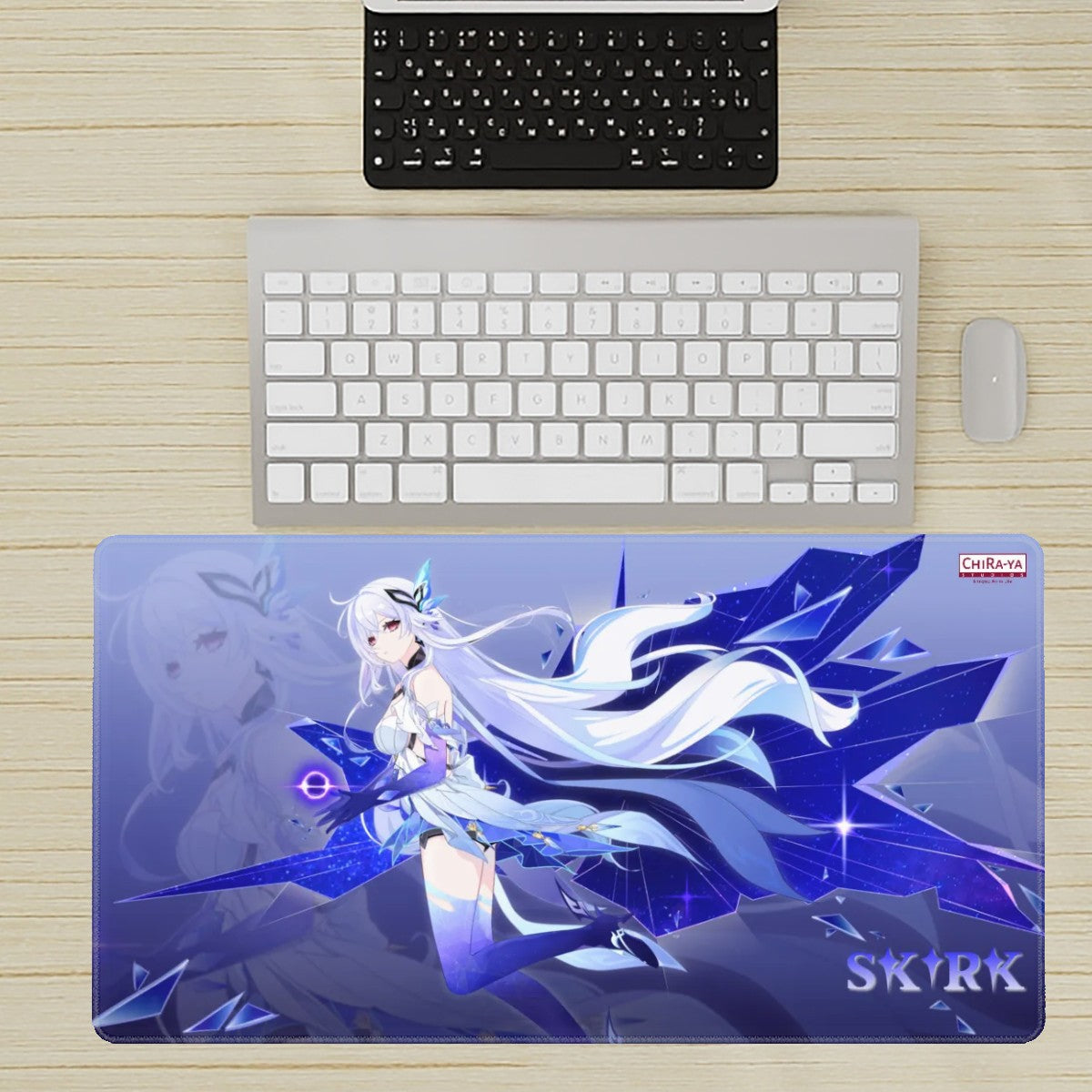desk setup with extra large anime mouse pad featuring Skirk