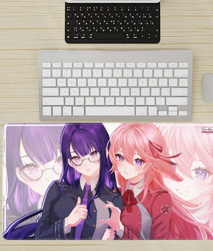 desk setup with extra large anime mouse pad featuring Raiden Ei and Yae Miko dressed as Takina and Chisato